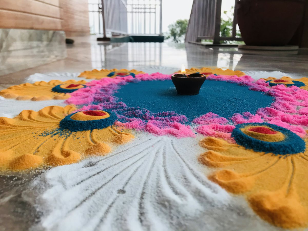 A rangoli at the Patidar Samaj Bhavan entrance